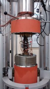 Triaxial Cell with Acoustic Emission Sensors attached to a Jacketed Sample. © Portsmouth University